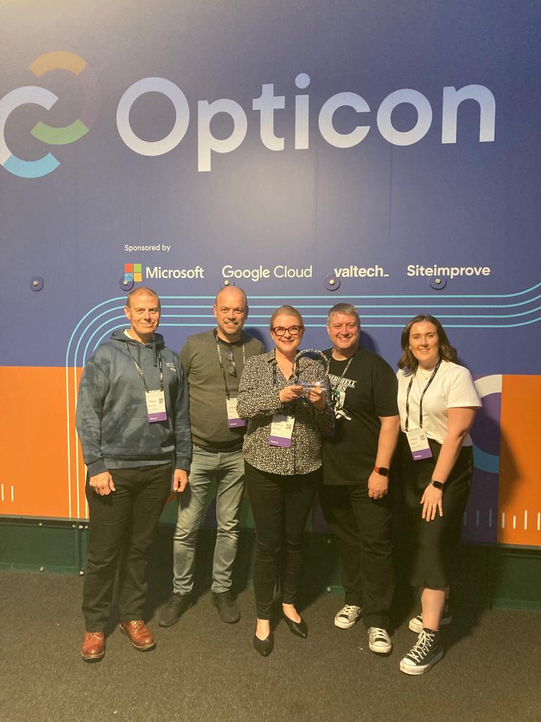 Myself and my fellow colleagues proudly sporting our trophy